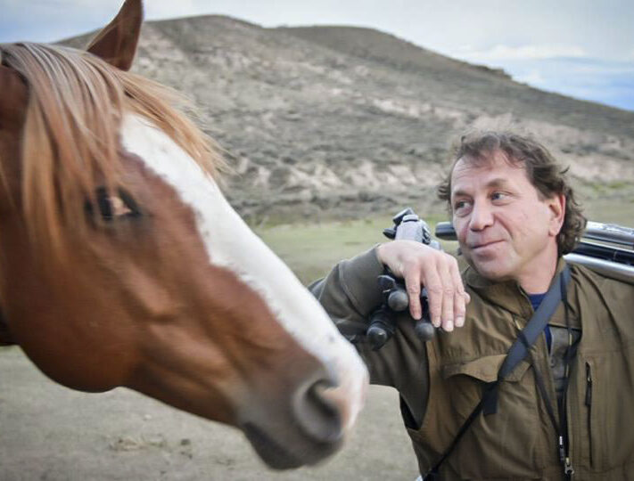 colorado photographer matt lit gets played with during a photography workshop. 